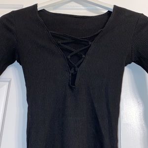 Crisscross black ribbed bodysuit